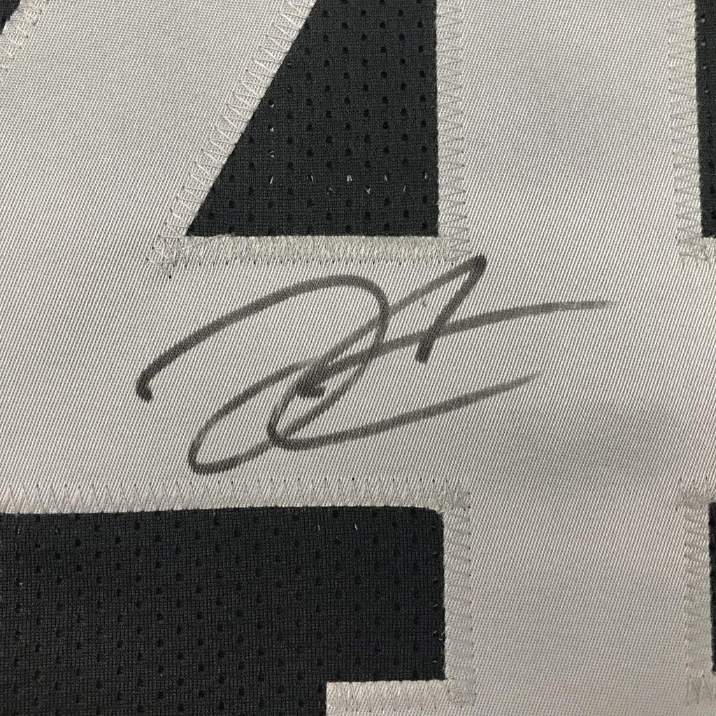 Autographed/Signed Derek Carr Oakland Black Football Jersey Beckett BAS COA