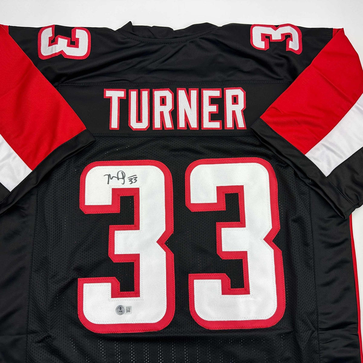 Autographed/Signed Michael Turner Atlanta Black Football Jersey Beckett BAS COA