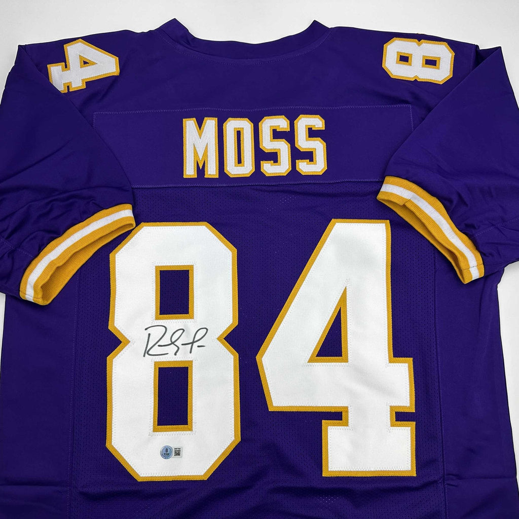 Autographed/Signed Randy Moss Minnesota Purple Football Jersey Beckett BAS COA