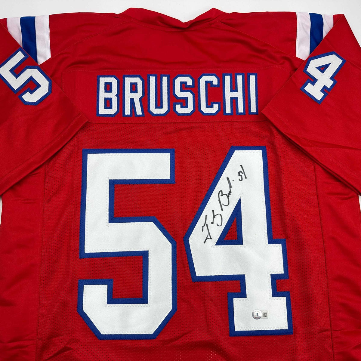 Autographed/Signed Tedy Bruschi New England Red Football Jersey Beckett BAS COA