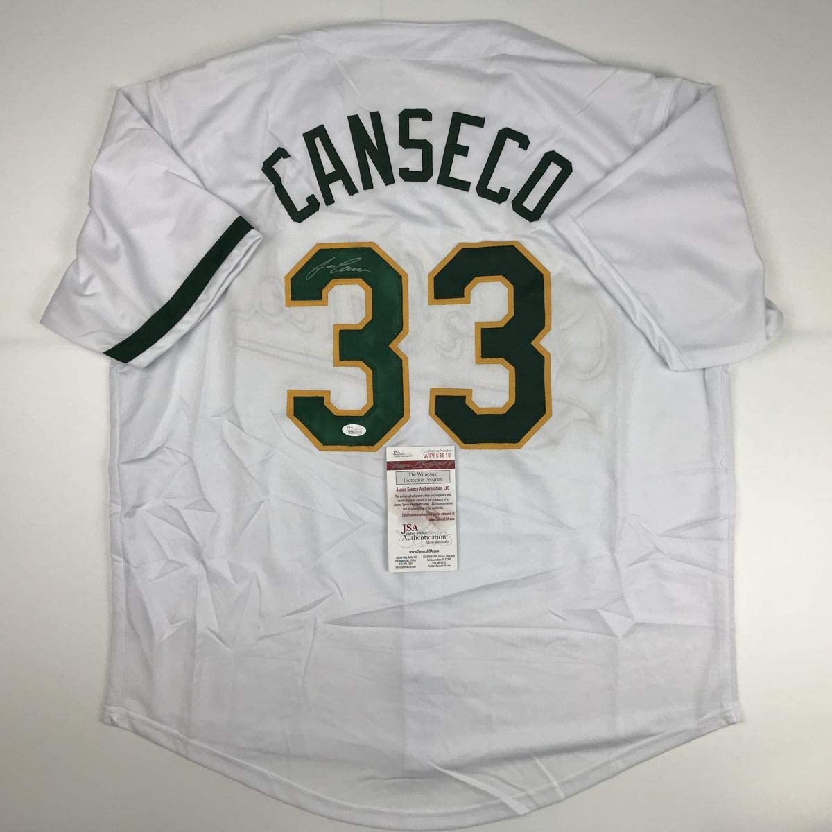 Autographed/Signed Jose Canseco Oakland White Baseball Jersey JSA COA