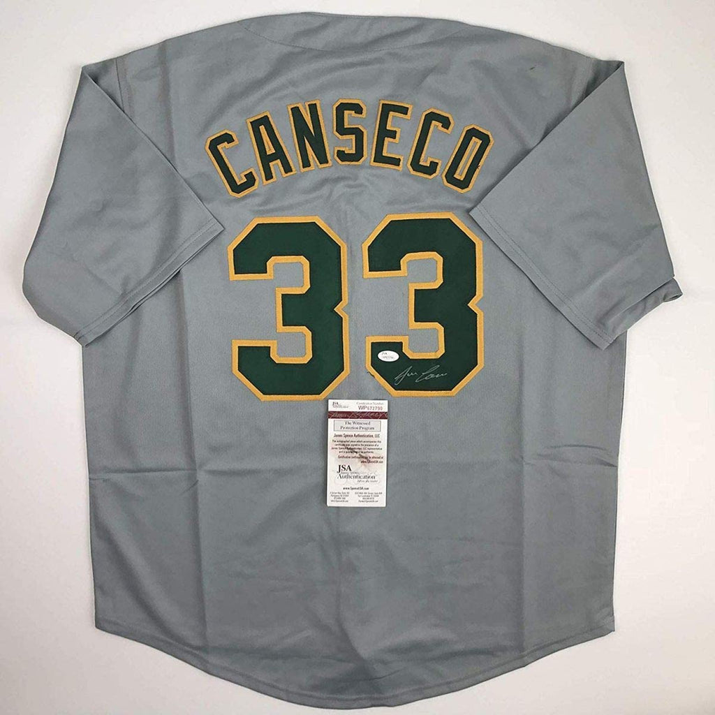 Autographed/Signed Jose Canseco Oakland Grey Baseball Jersey JSA COA