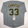 Autographed/Signed Jose Canseco Oakland Grey Baseball Jersey JSA COA