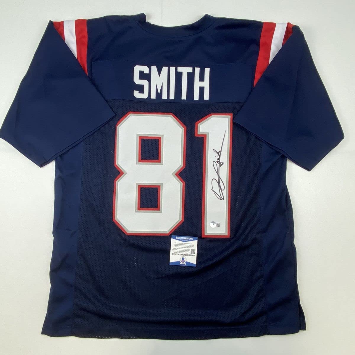 Autographed/Signed Jonnu Smith New England Blue Football Jersey Beckett BAS COA