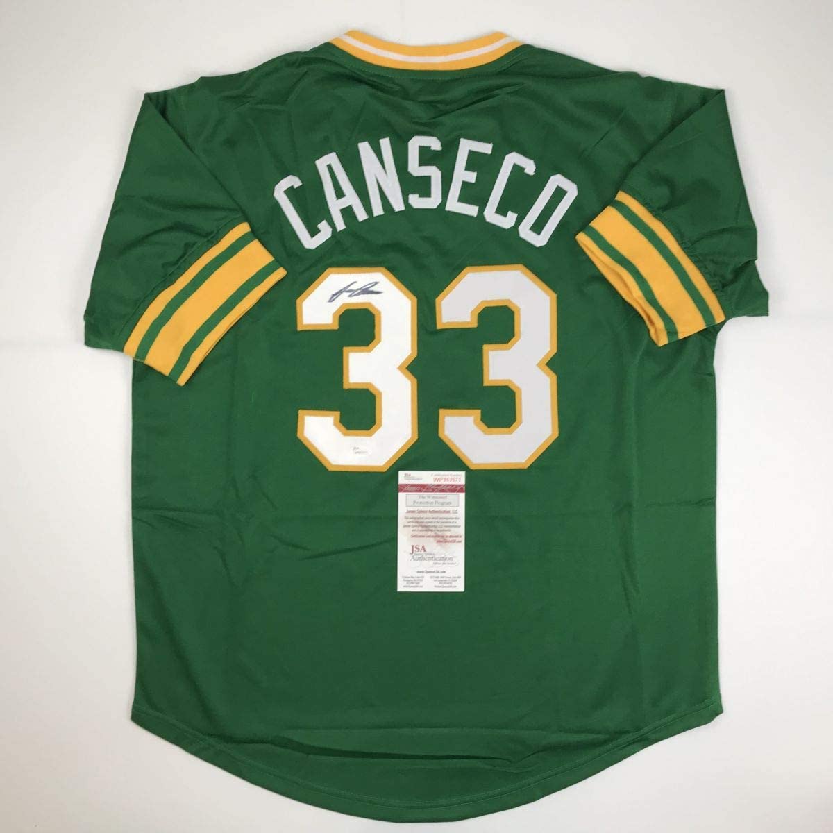 Autographed/Signed Jose Canseco Oakland Green Baseball Jersey JSA COA