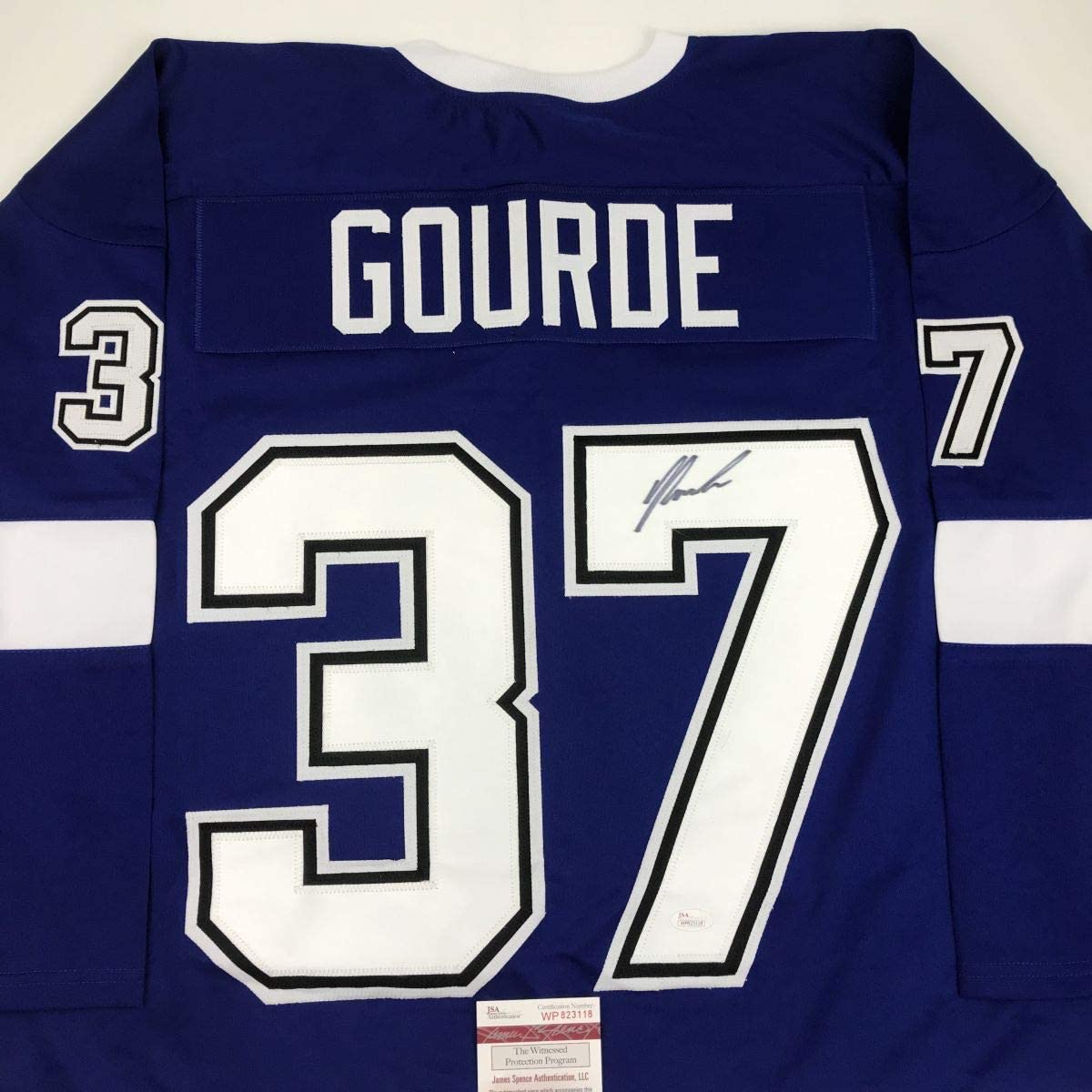Autographed/Signed Yanni Gourde Tampa Bay Blue Hockey Jersey JSA COA