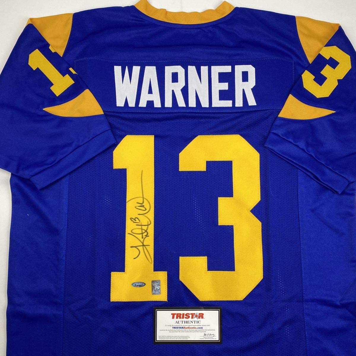 Autographed/Signed Kurt Warner St. Louis Blue Football Jersey Tristar COA