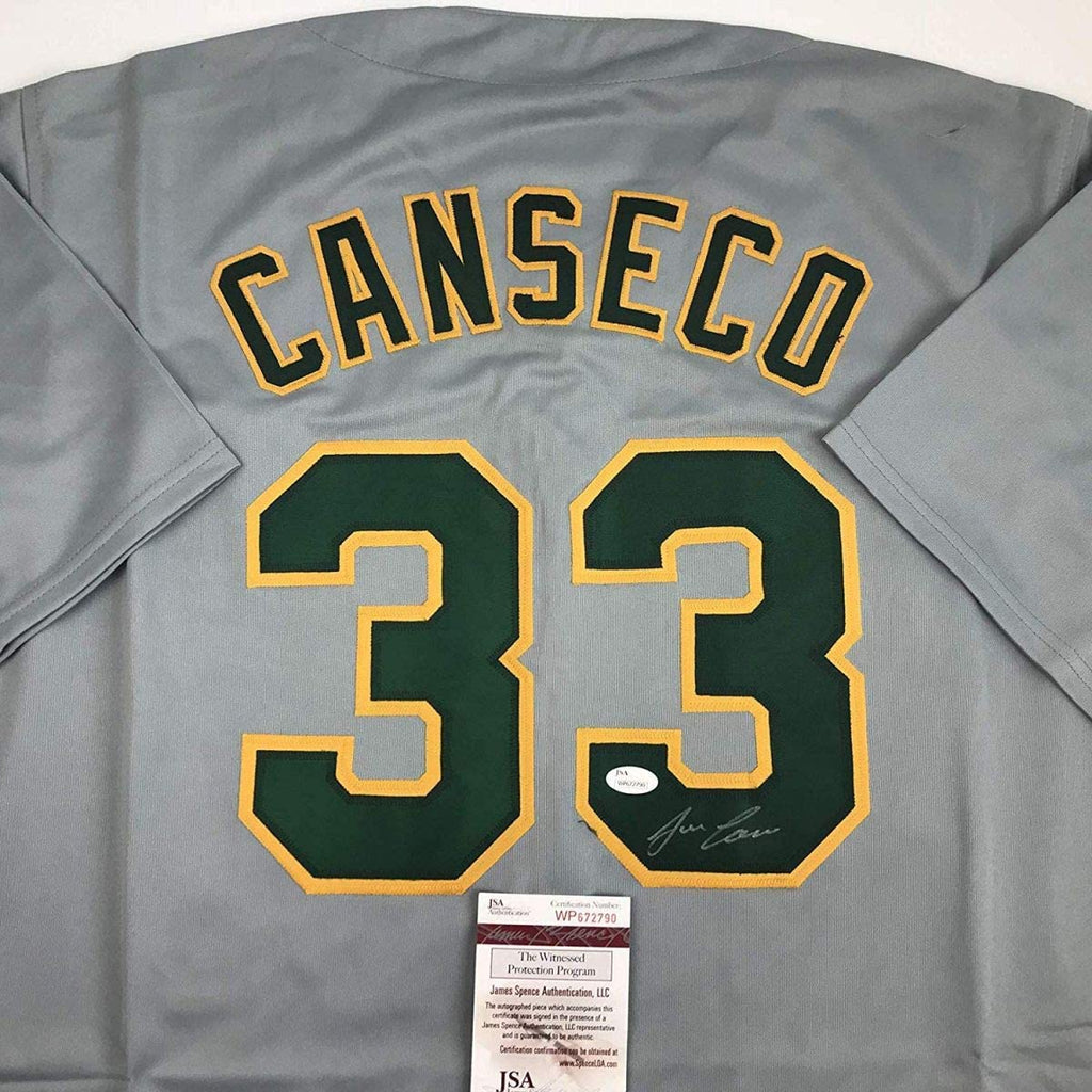 Autographed/Signed Jose Canseco Oakland Grey Baseball Jersey JSA COA