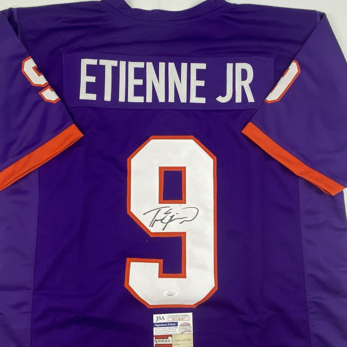 Autographed/Signed Travis Etienne Jr. Clemson Purple College Football Jersey JSA COA