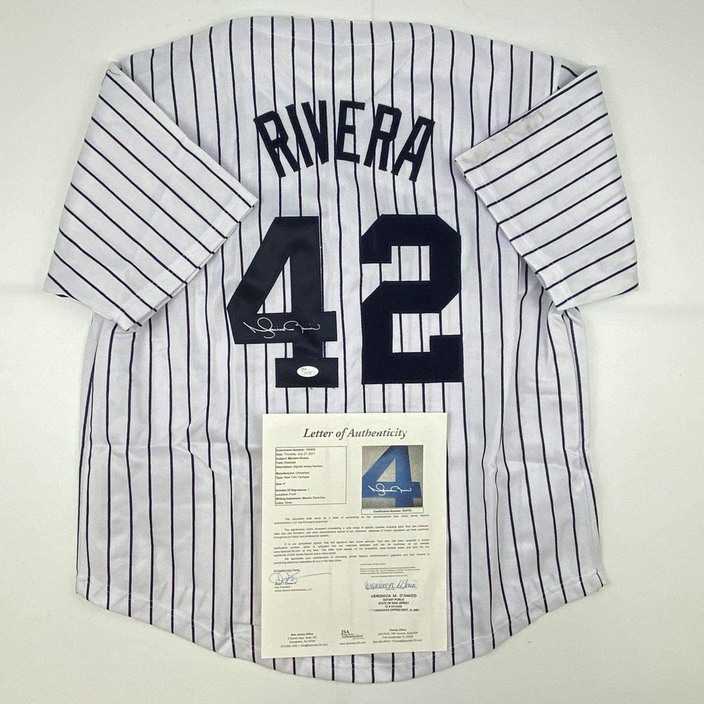 Autographed/Signed Mariano Rivera New York Pinstripe Baseball Jersey JSA COA/LOA