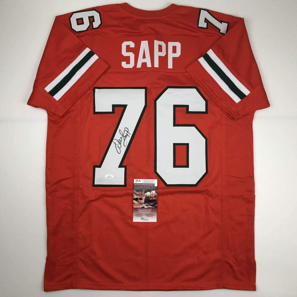 Autographed/Signed Warren Sapp Miami Orange Football Jersey JSA COA