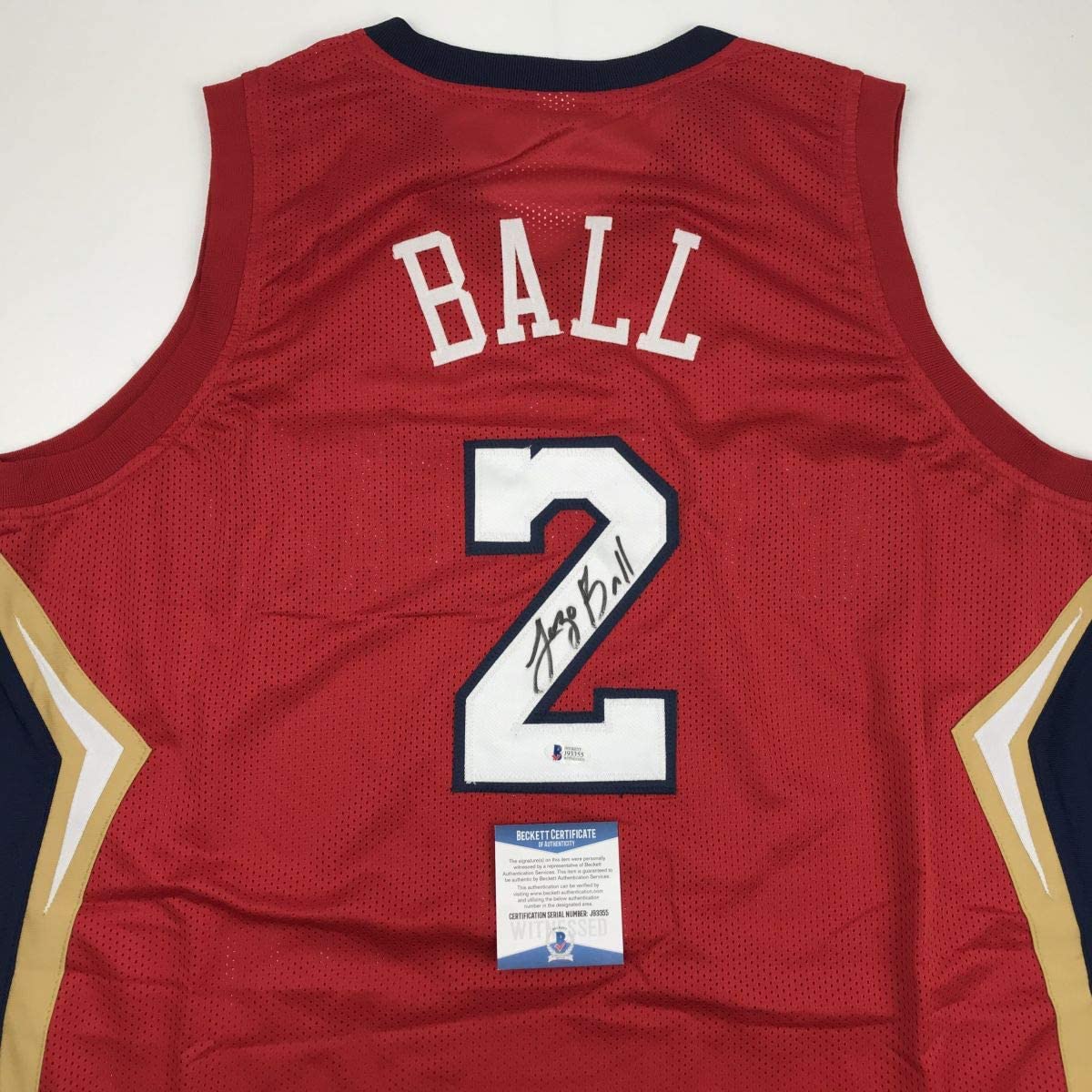 Autographed/Signed Lonzo Ball New Orleans Red Basketball Jersey Beckett BAS COA
