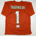 Autographed/Signed Tua Tagovailoa Miami Orange Football Jersey Beckett BAS COA