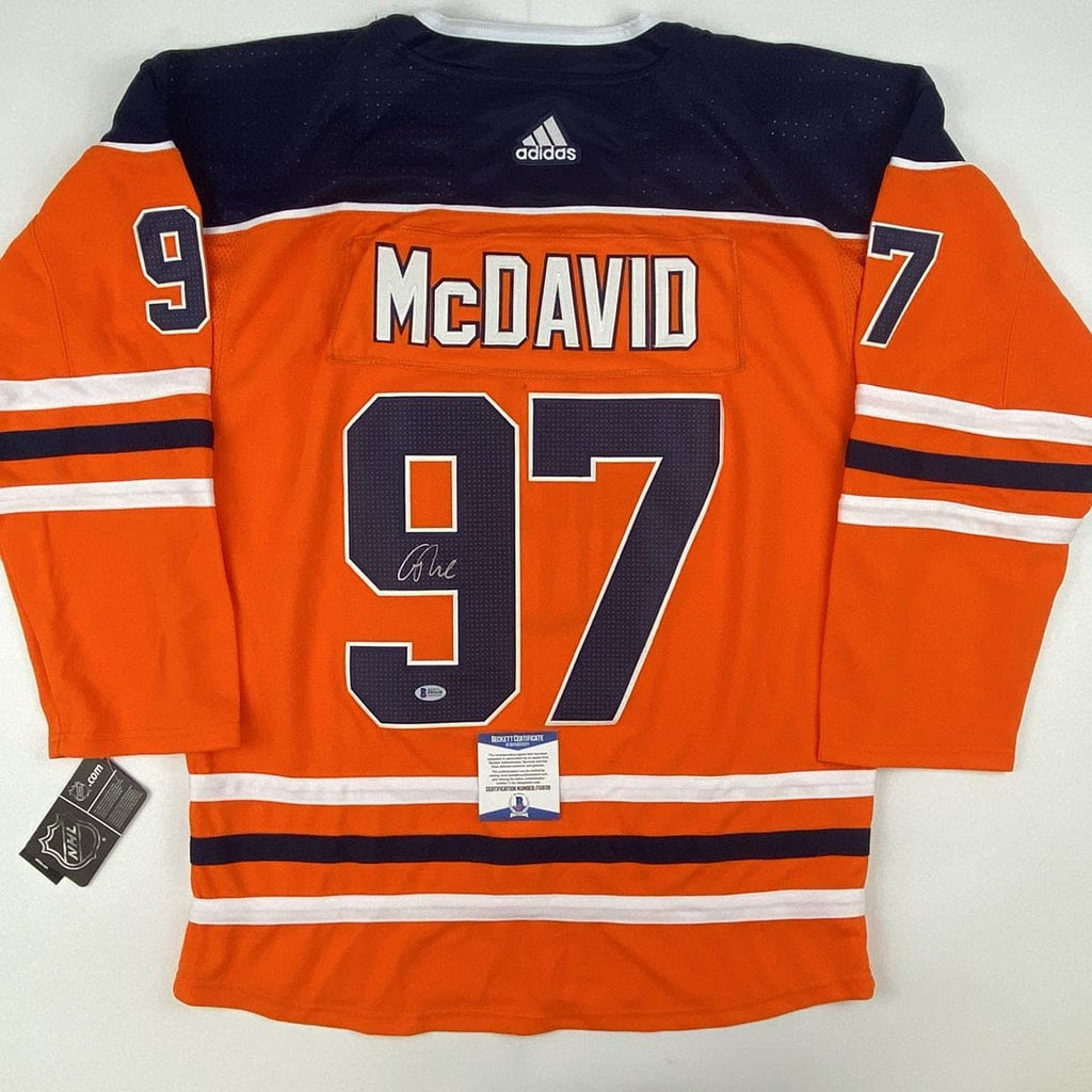 Autographed/Signed Connor McDavid Edmonton Orange Hockey Jersey Beckett BAS COA