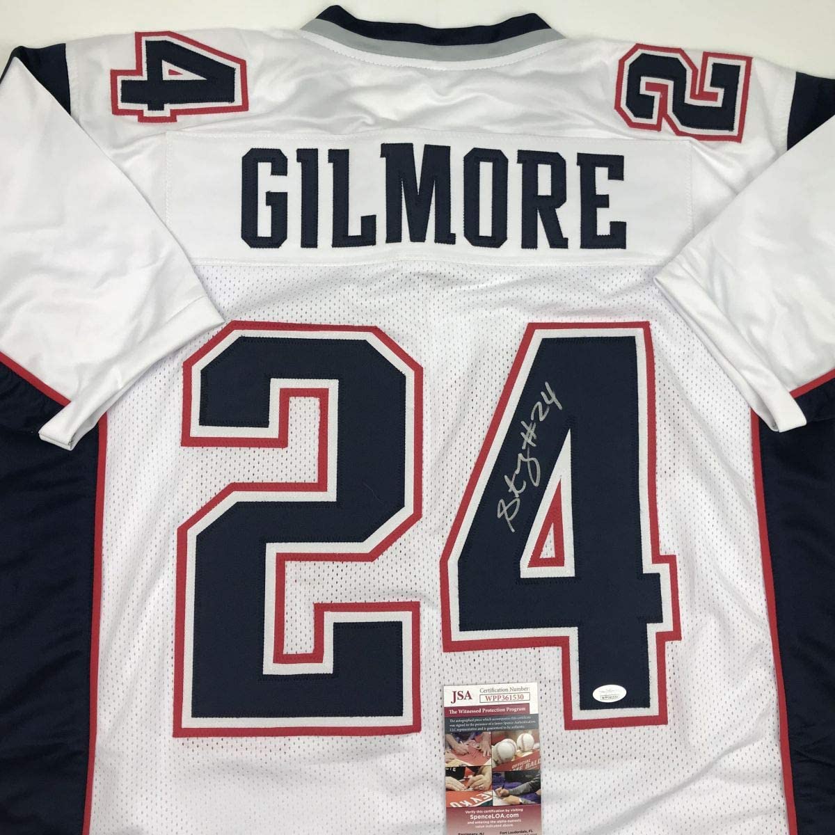 Autographed/Signed Stephon Gilmore New England White Football Jersey JSA COA