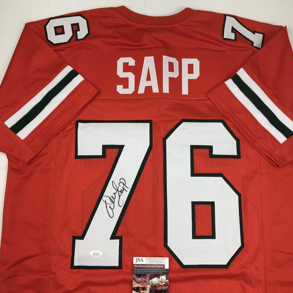 Autographed/Signed Warren Sapp Miami Orange Football Jersey JSA COA