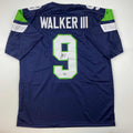 Autographed/Signed Kenneth Walker Seattle Blue Football Jersey Beckett BAS COA #2