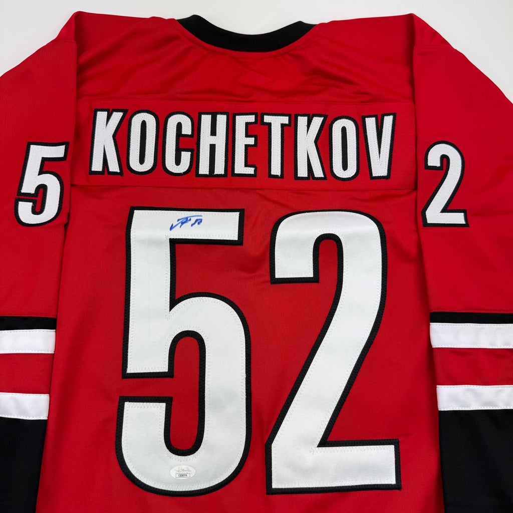 Autographed/Signed Pyotr Kochetkov Carolina Red Hockey Jersey JSA COA