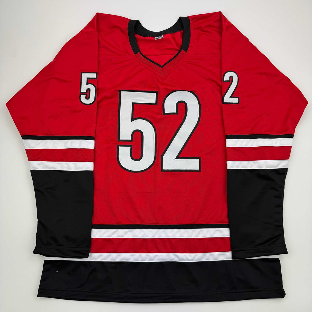 Autographed/Signed Pyotr Kochetkov Carolina Red Hockey Jersey JSA COA
