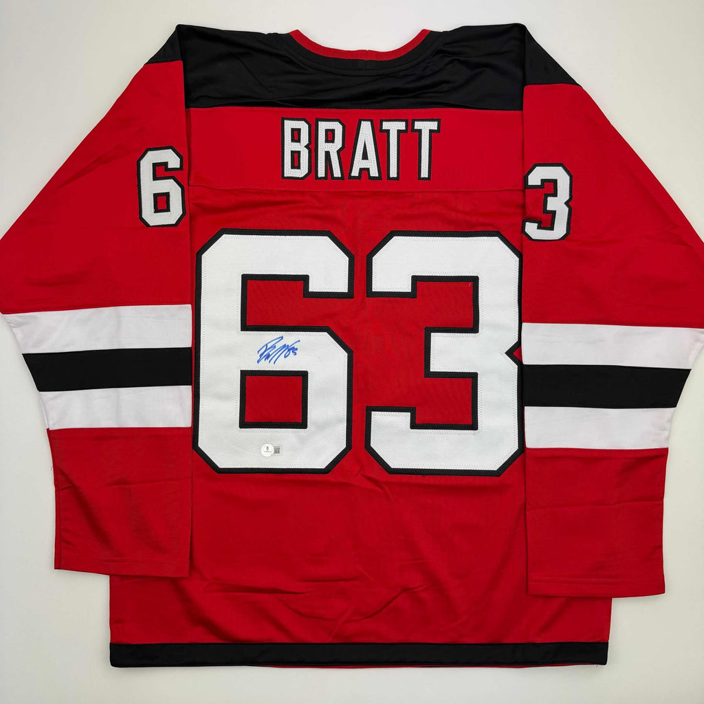Autographed/Signed Jesper Bratt New Jersey Red Hockey Jersey Beckett BAS COA