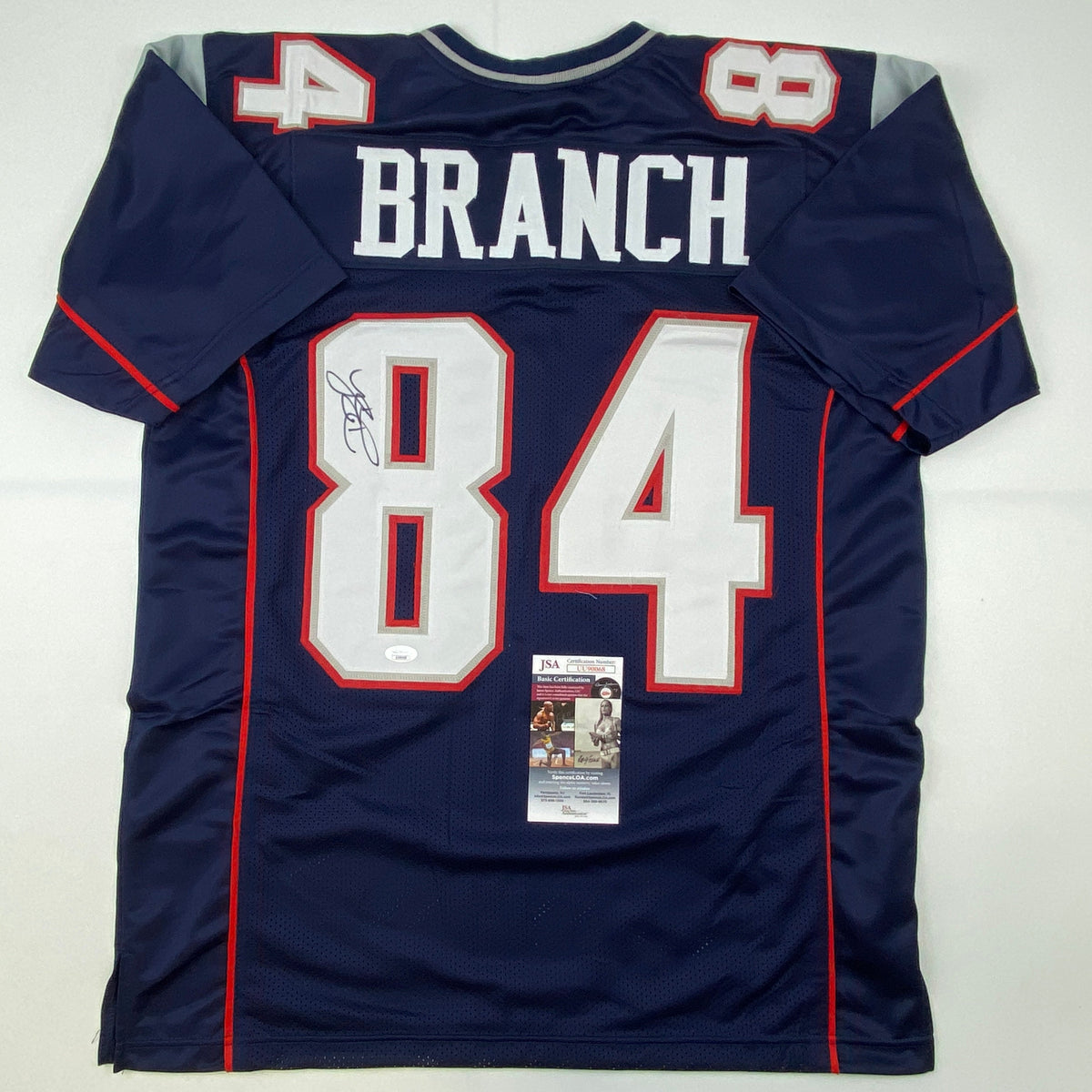 Autographed/Signed Deion Branch #84 New England Blue Football Jersey JSA COA