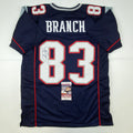 Autographed/Signed Deion Branch #83 New England Blue Football Jersey JSA COA