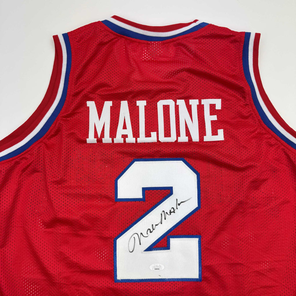 Autographed/Signed Moses Malone Philadelphia Red Basketball Jersey JSA COA