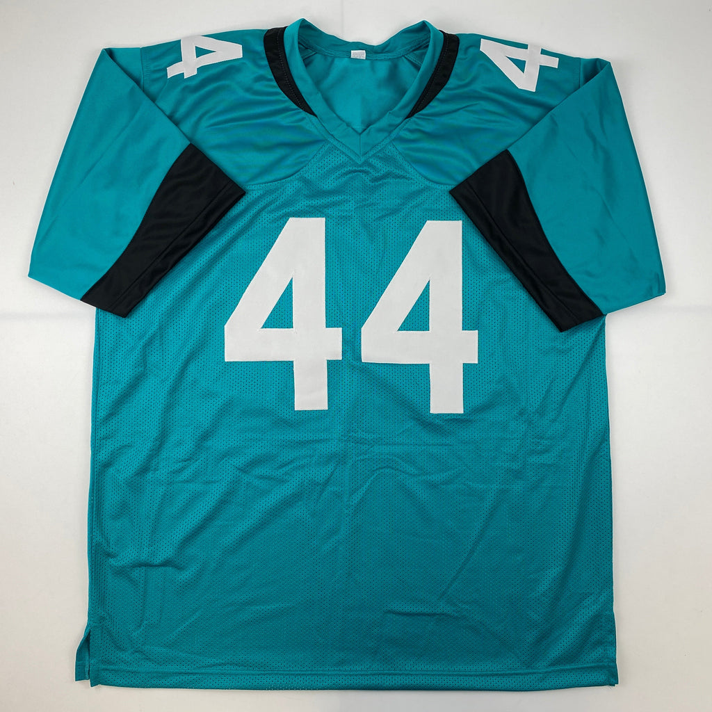 Autographed/Signed Travon Walker Jacksonville Teal Football Jersey Beckett BAS COA