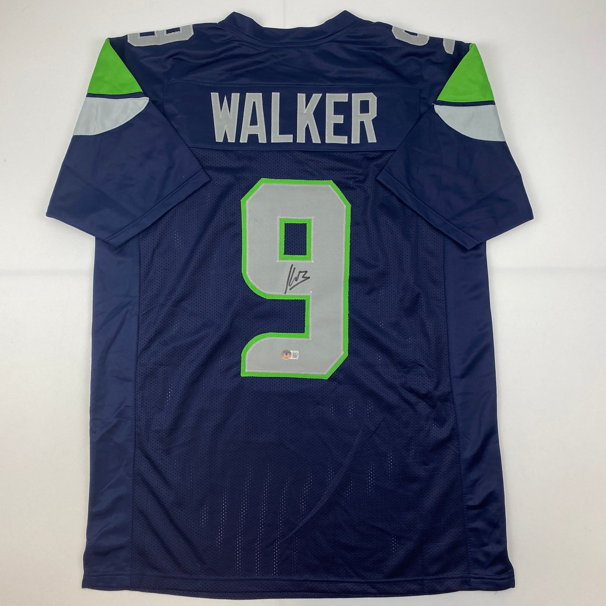 Autographed/Signed Kenneth Walker Seattle Blue Football Jersey Beckett BAS COA